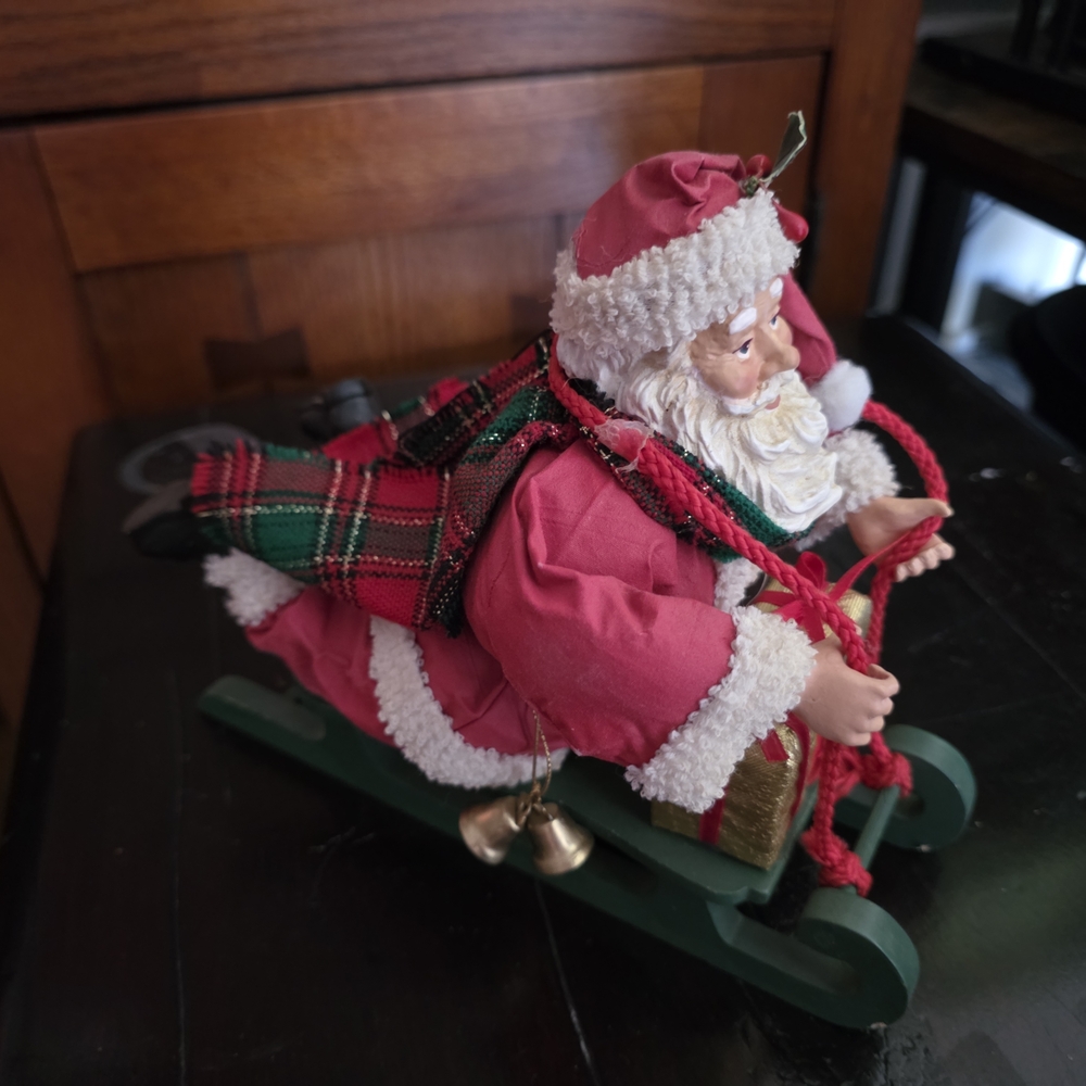Santa Claus Figurine on Sled